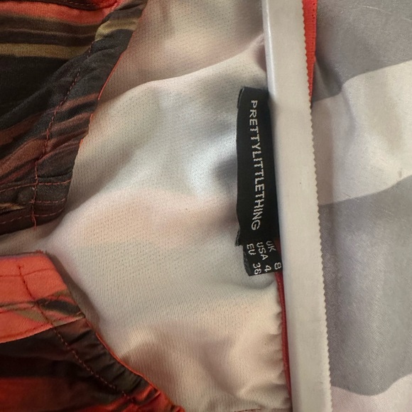 Orange Abstract Print Mini Skin set
PRETTYLITTLETHING - Picture 4 of 6